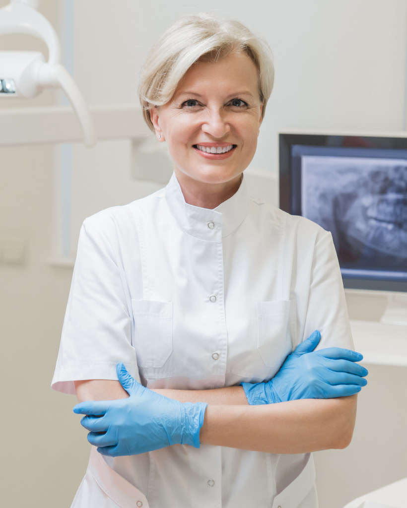 dentist with arms crossed